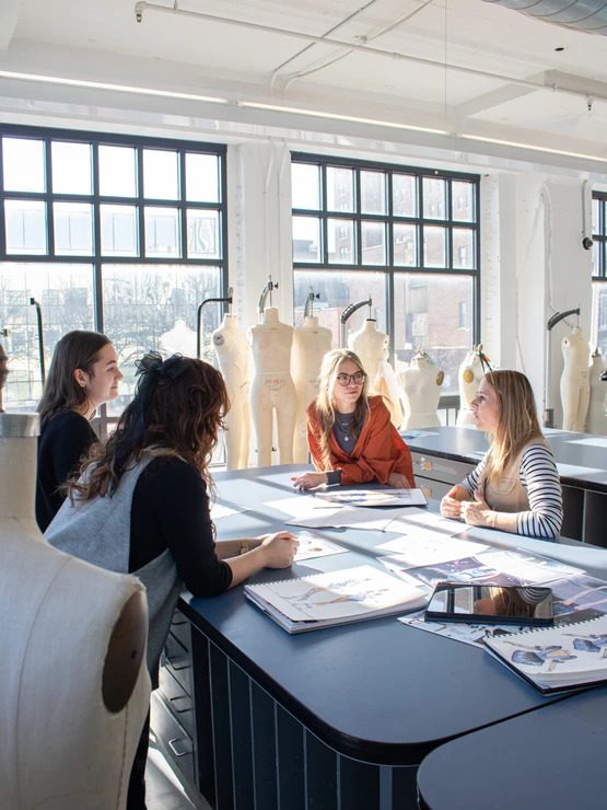 Students Talking In Fashion Studio
